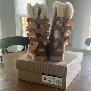 UGG Women's Tan Boots with Fur and Bow Accents